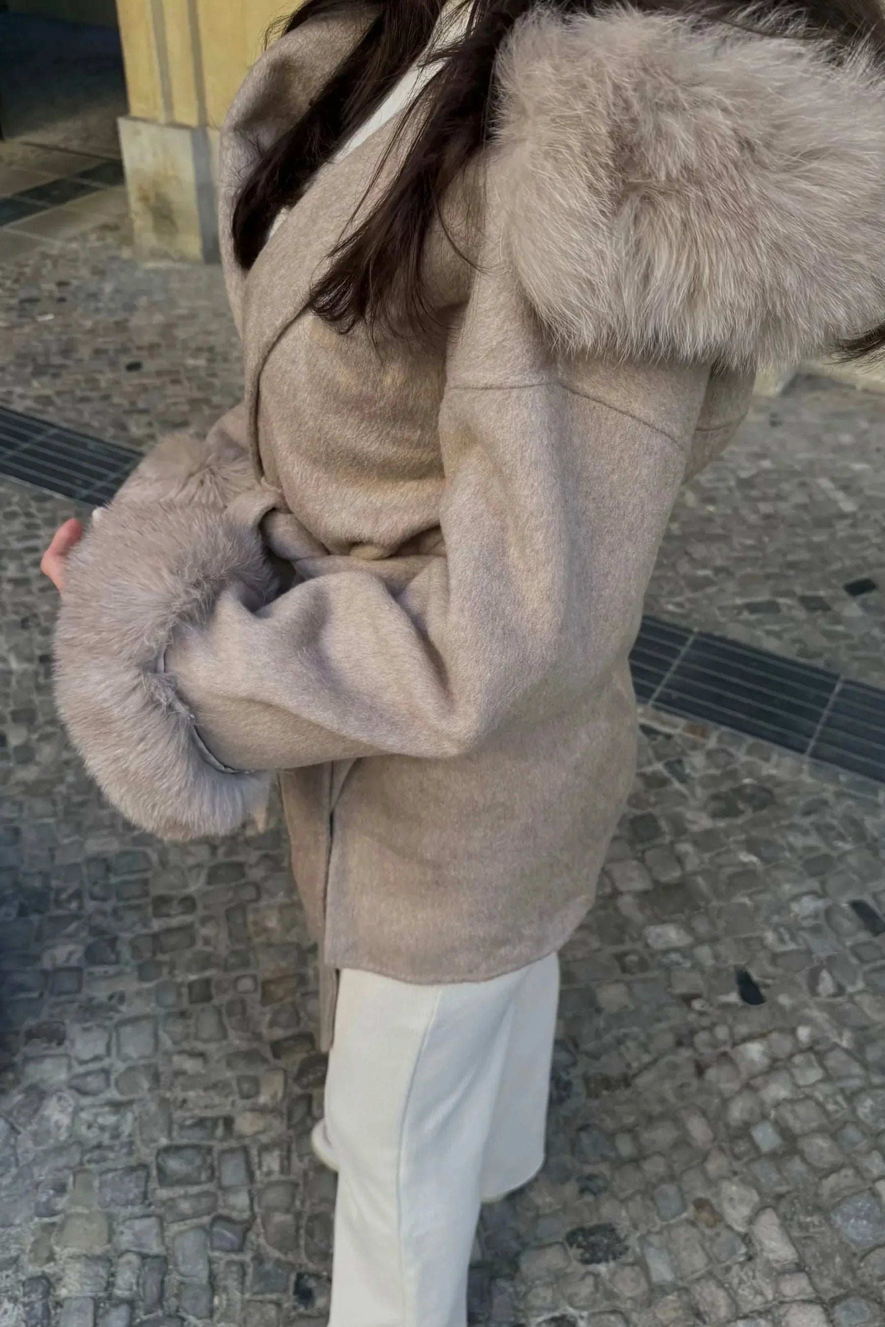 Luxurious fake fur coat with hood